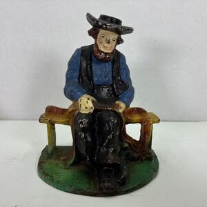 Cast Iron Doorstop/Bookend Amish Man Sitting on Bench